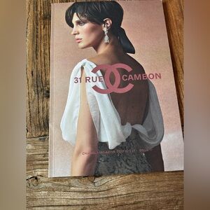 CHANEL 31 Rue Cambon Magazine Cover with White and Pink Accents